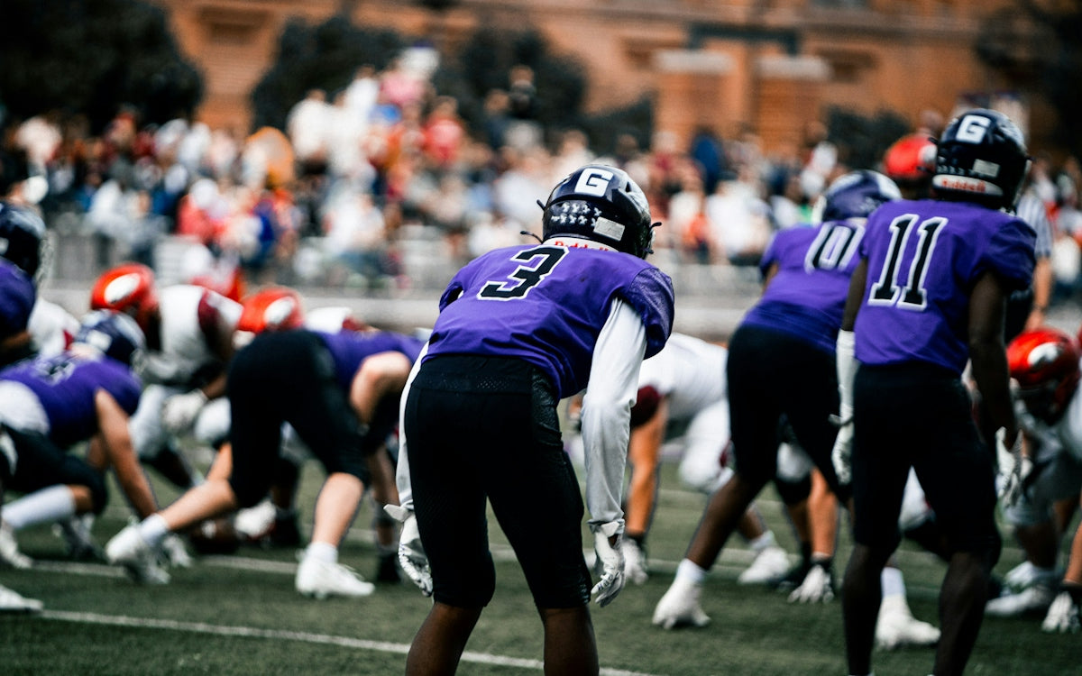 a group of people playing football