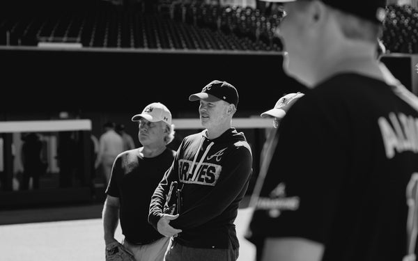 A group of men standing next to each other
